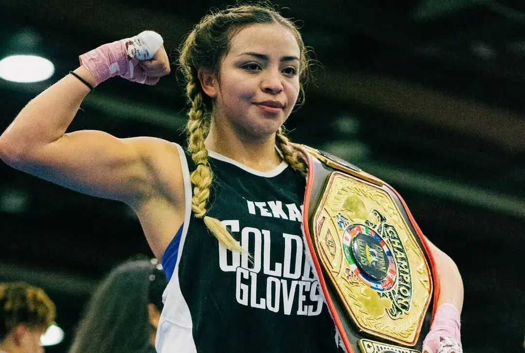 Kayla Gomez with her National Golden Gloves title belt. Photo from Gomez's Instagram