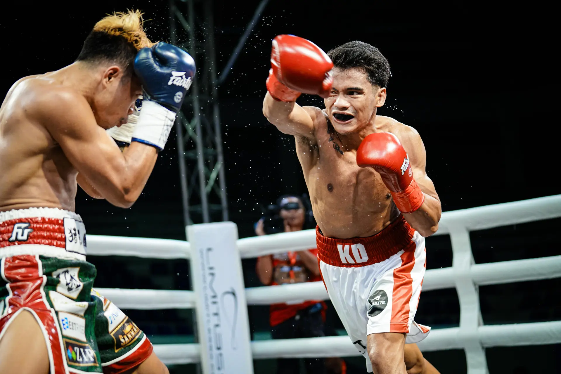 Miel Fajardo fires a right hand at Esneth Domingo