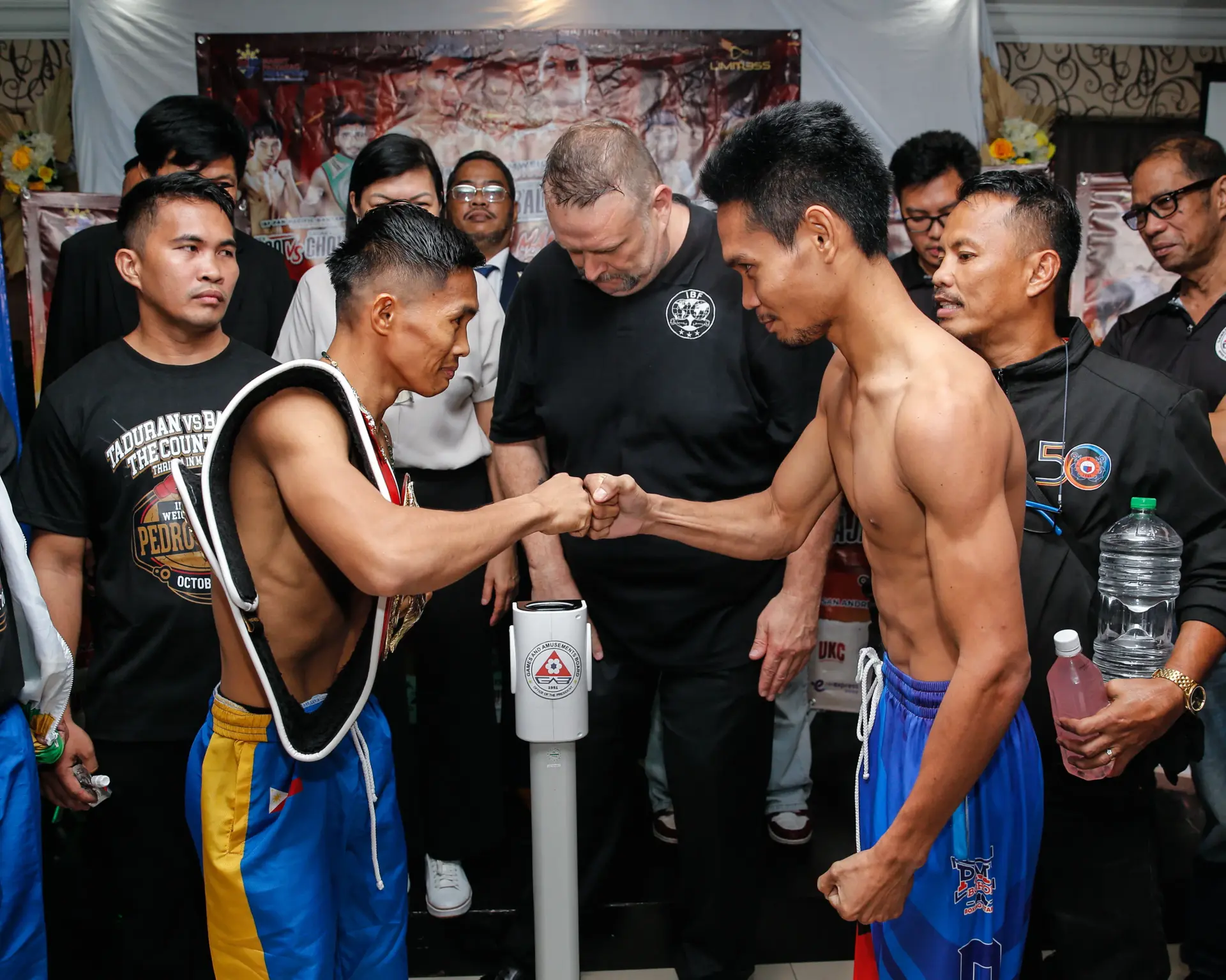 Pedro Taduran and Christian Balunan share a fist bump after making weight