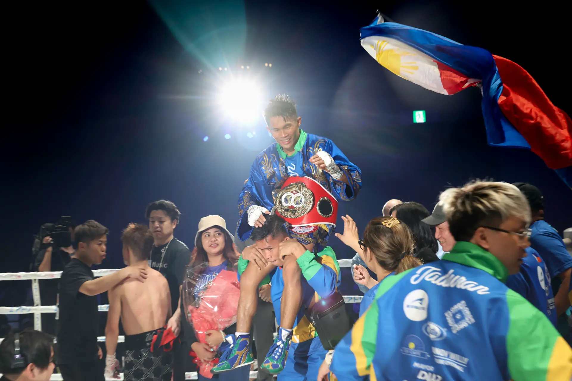 Pedro Taduran is lifted on his cornerman's shoulders after defeating Ginjiro Shigeoka a second time