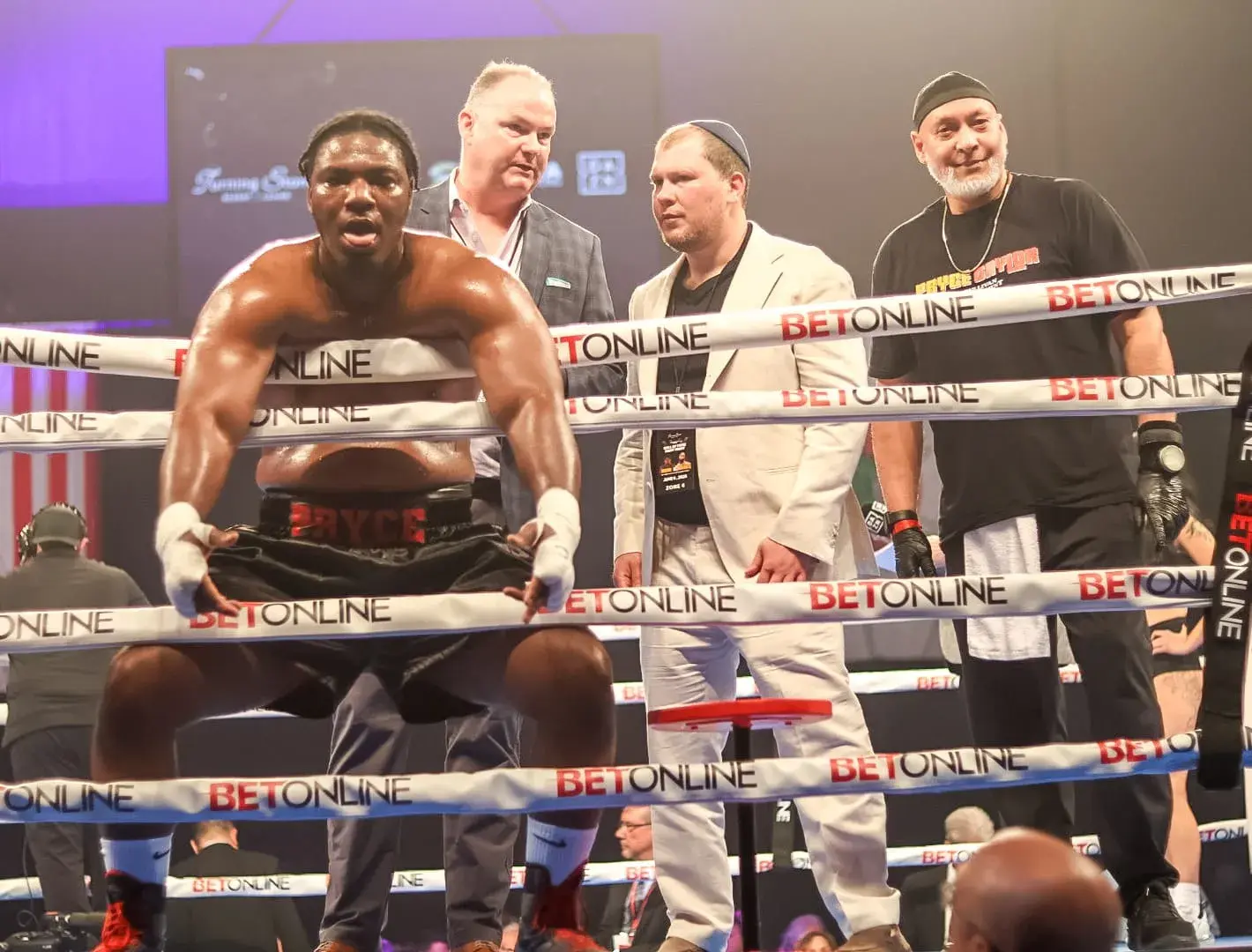 Pryce Taylor with trainer Benny Roman, promoter Dmitriy Salita and manager Keith Sullivan