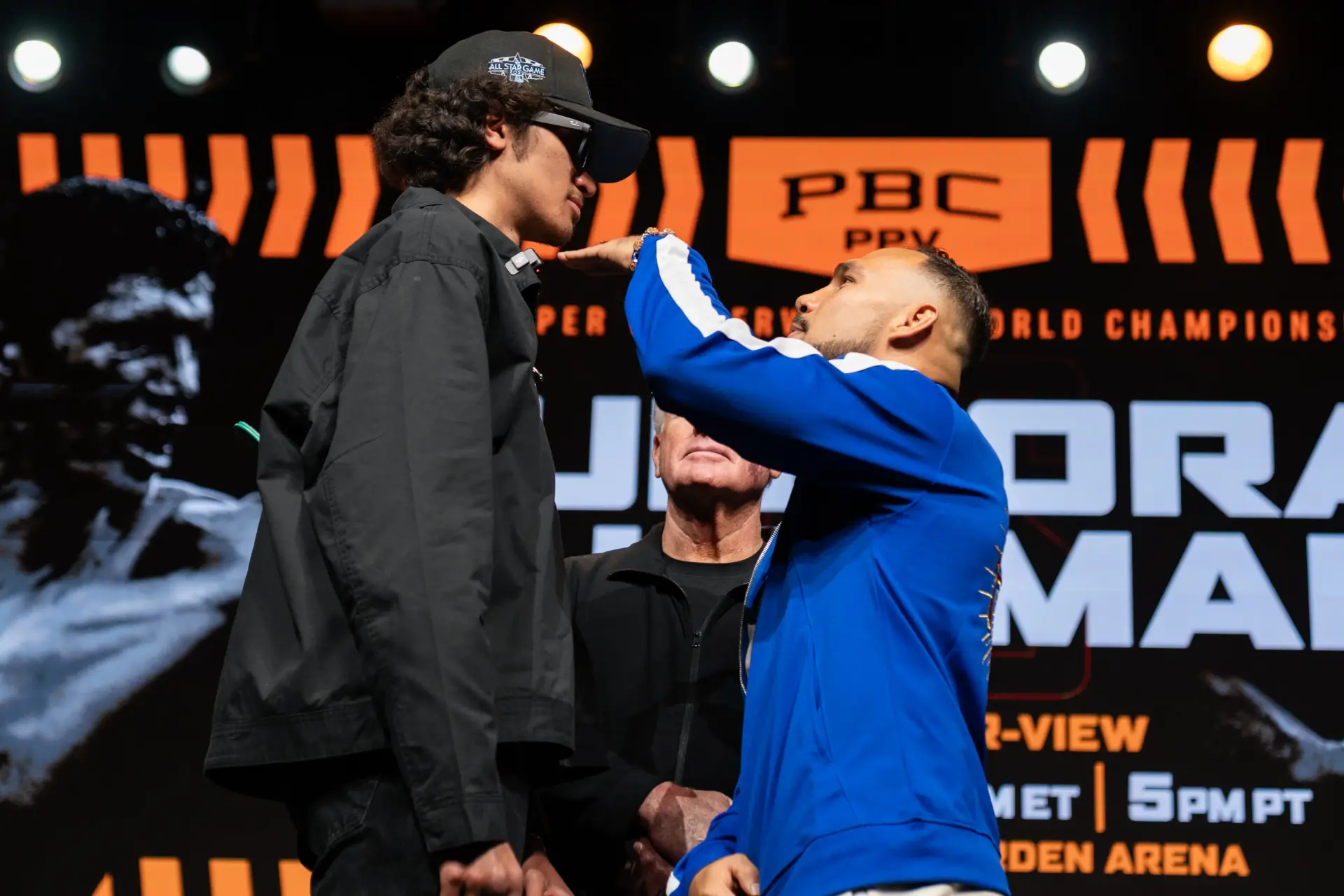 Keith Thurman measures up Sebastian Fundora at their press conference