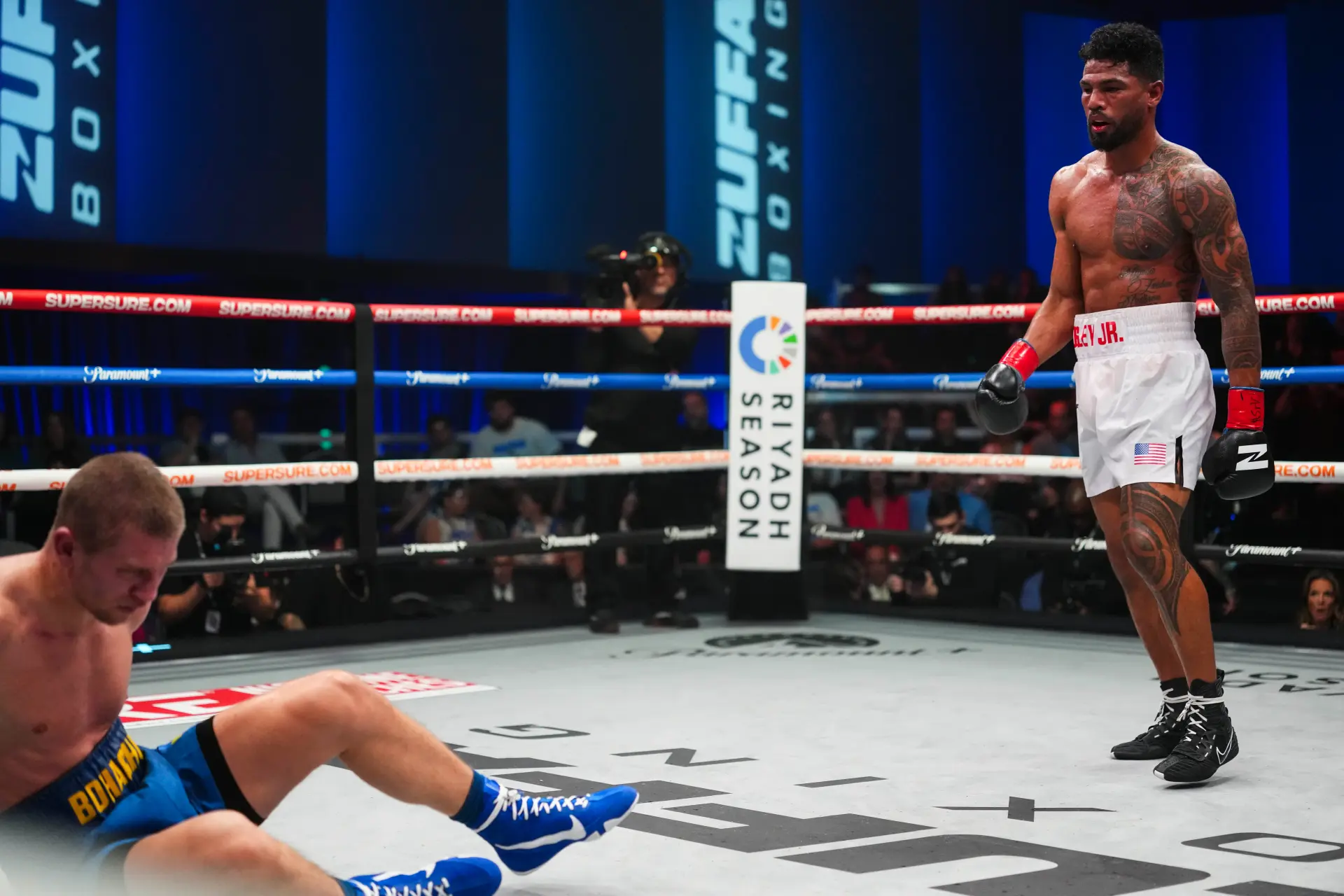 Shane Mosley drops Serhii Bohachuk with a right hand.