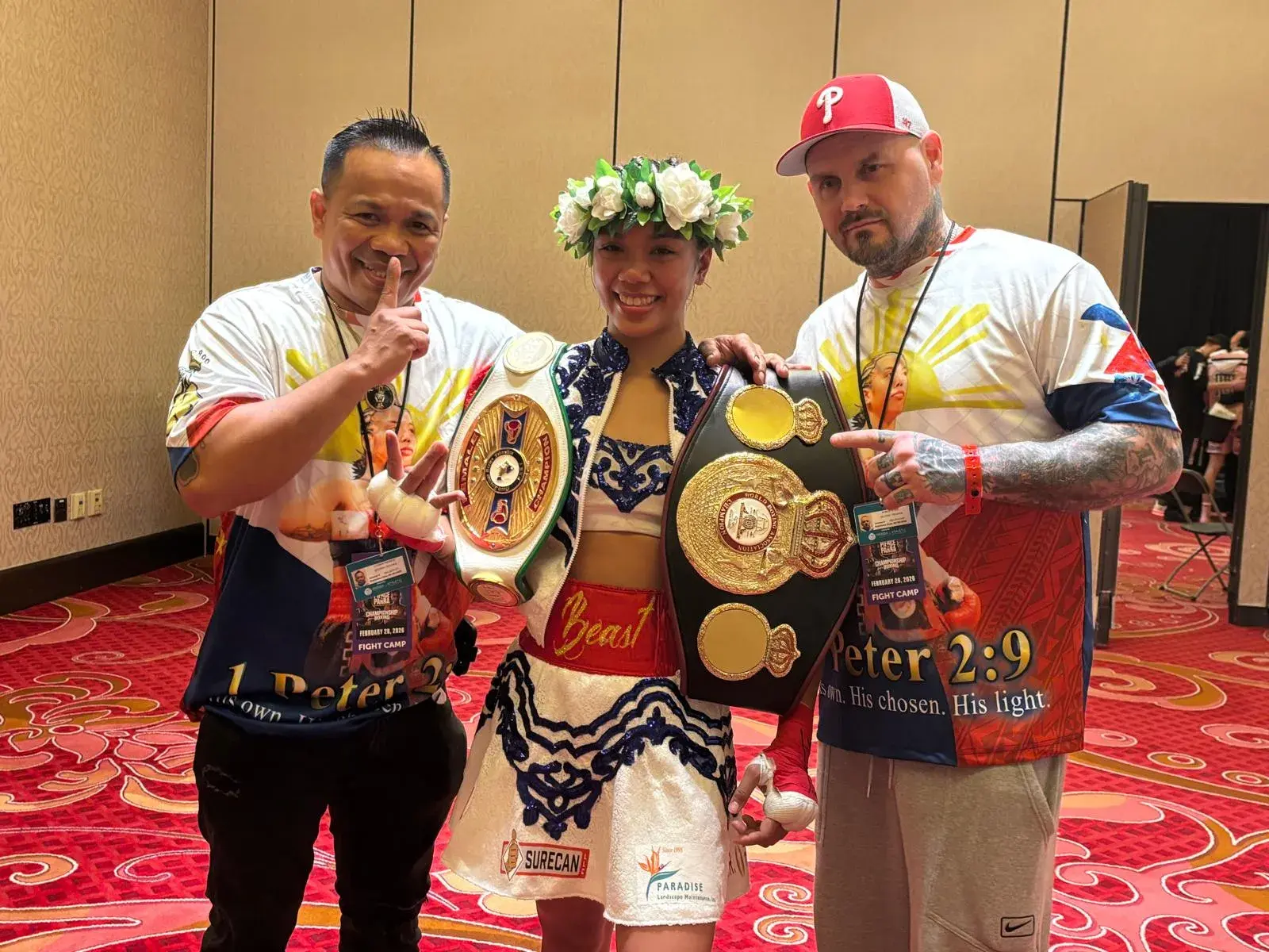 Shera Mae Patricio (C) with her father Lyndon (L) and manager Bob Kane (R).