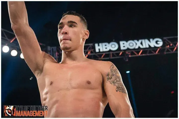 Steven Butler raises his arm before a fight