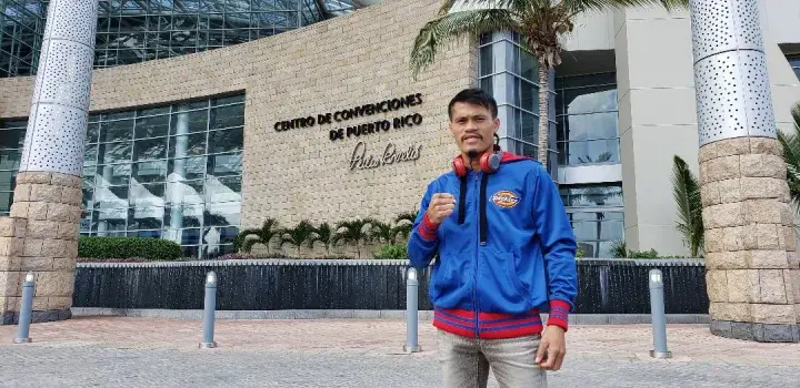 Vic Saludar poses outside El Centro de Convenciones De Puerto Rico in an undated photo.