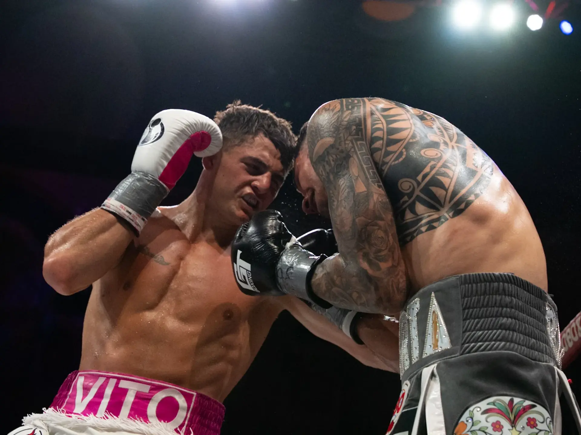 Vito Mielnicki Jnr digs to the body of Omar Huerta