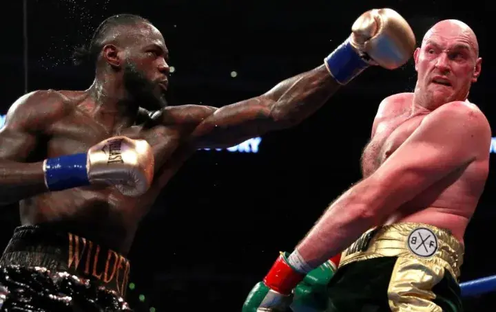 Deontay Wilder on the attack in December 2018 in the first of three epic battles with Tyson Fury